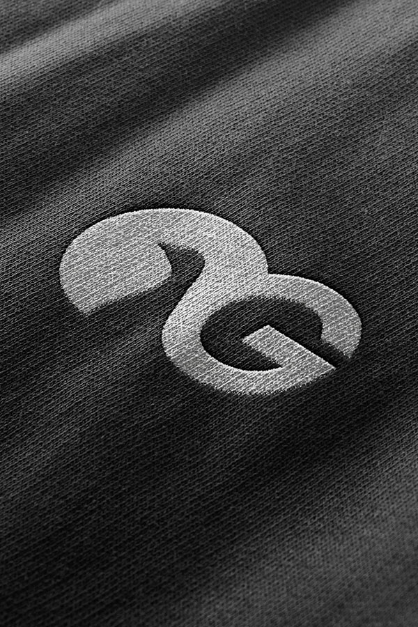 Das aufgedruckte Obere Ganskeller Logo auf einem Kleidungsstück.