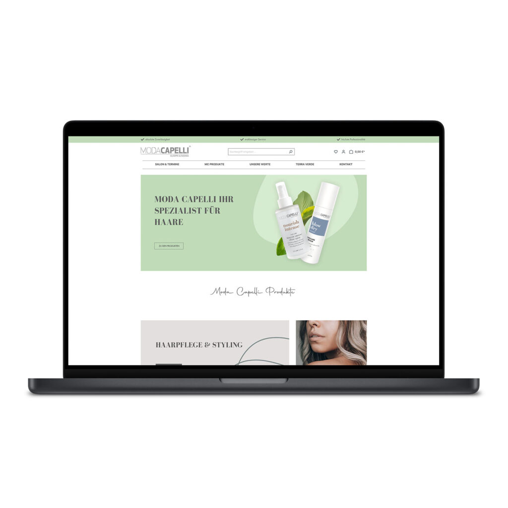 Die Startseite von Moda Capelli auf einem Laptop.